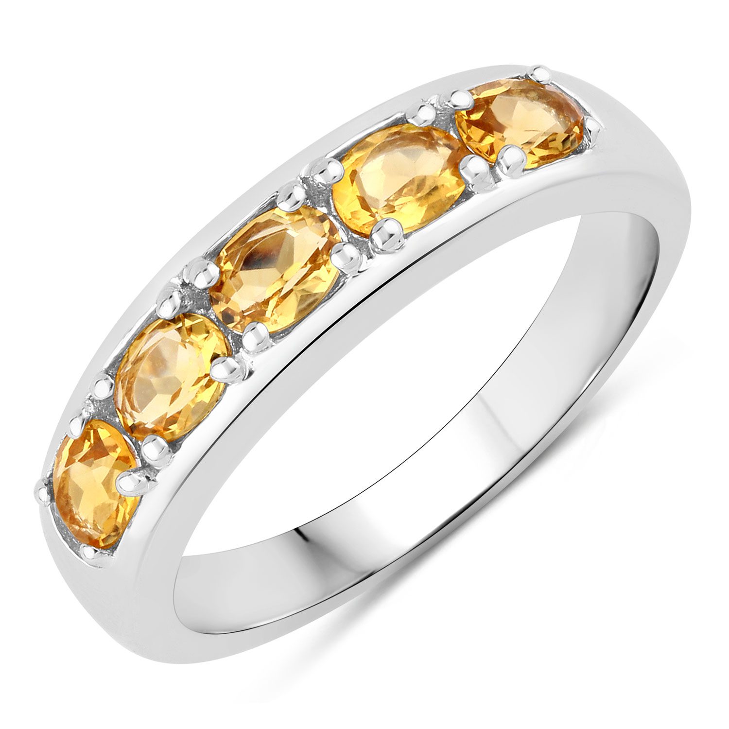 Silver ring with yellow gemstones.